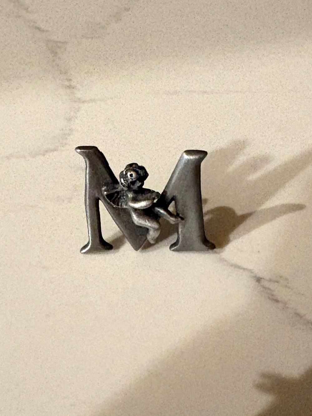 Initial 'M' Angel Pin in Metallic Silver